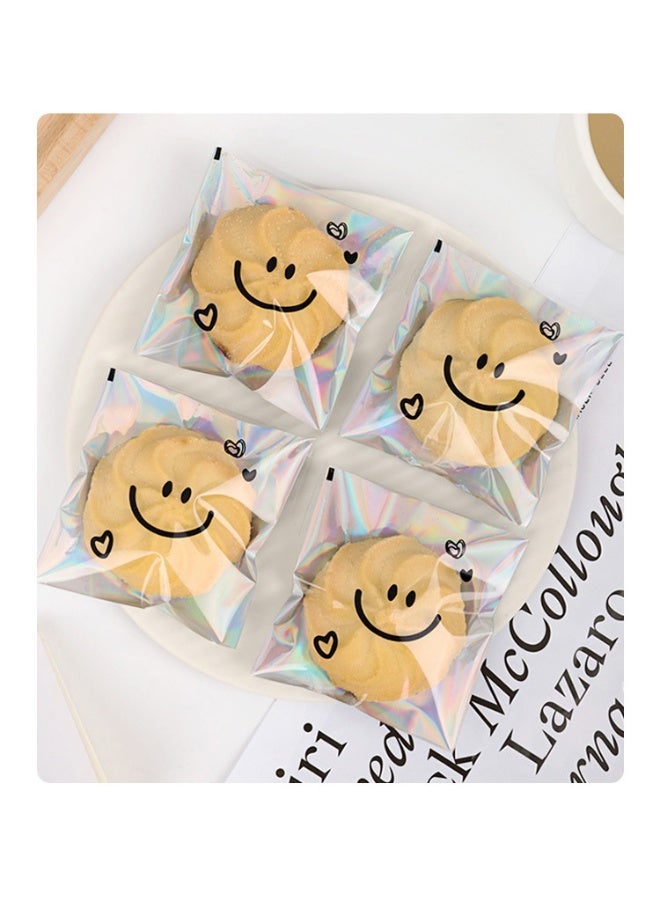 RTYY 100 كيس لاصق ذاتي للبسكويت، أكياس سيلوفان قابلة لإعادة الإغلاق، أكياس بلاستيكية مزينة بتعبيرات لطيفة لخبز البسكويت والحلوى، أكياس بلاستيكية شفافة للحلويات، أكياس تغليف فردية للحلوى، أكياس سيلوفان لتوزيعات الحفلات، لتغليف البسكويت والشوكولاتة والوجبات الخفيفة والمخبوزات (10 × 10 سم). - Image 2